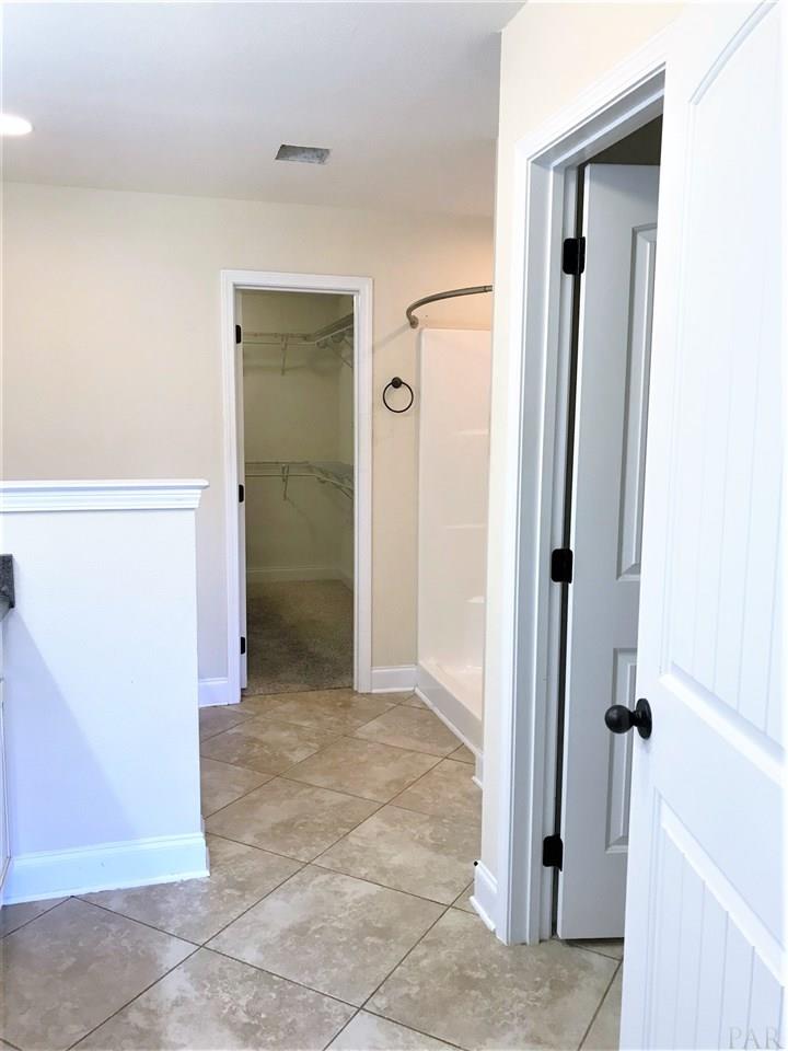 3839 Adams Road Pace, FL 32571 - Photo 13 of 27 Separate shower, soaking tub, and water closet.