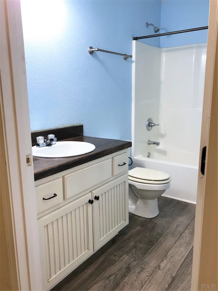 3839 Adams Road Pace, FL 32571 - Photo 18 of 27 Guest bathroom with custom countertop.