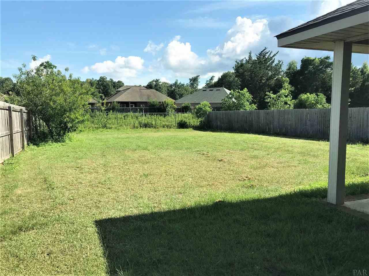 3839 Adams Road Pace, FL 32571 - Photo 20 of 27 Very large fully fenced backyard.