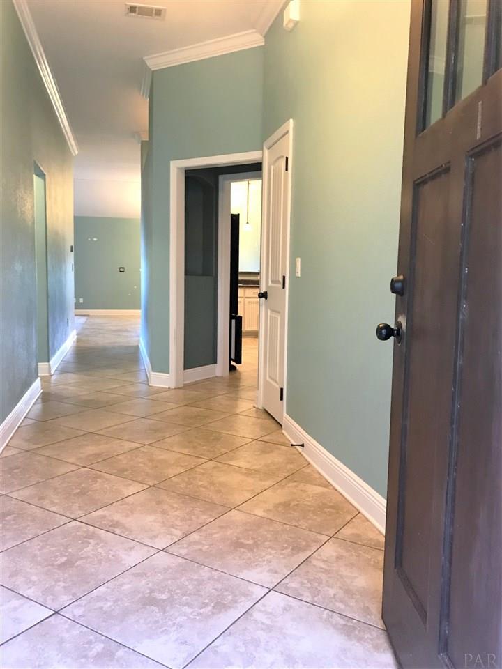 3839 Adams Road Pace, FL 32571 - Photo 4 of 27 Wide foyer with coat closet.