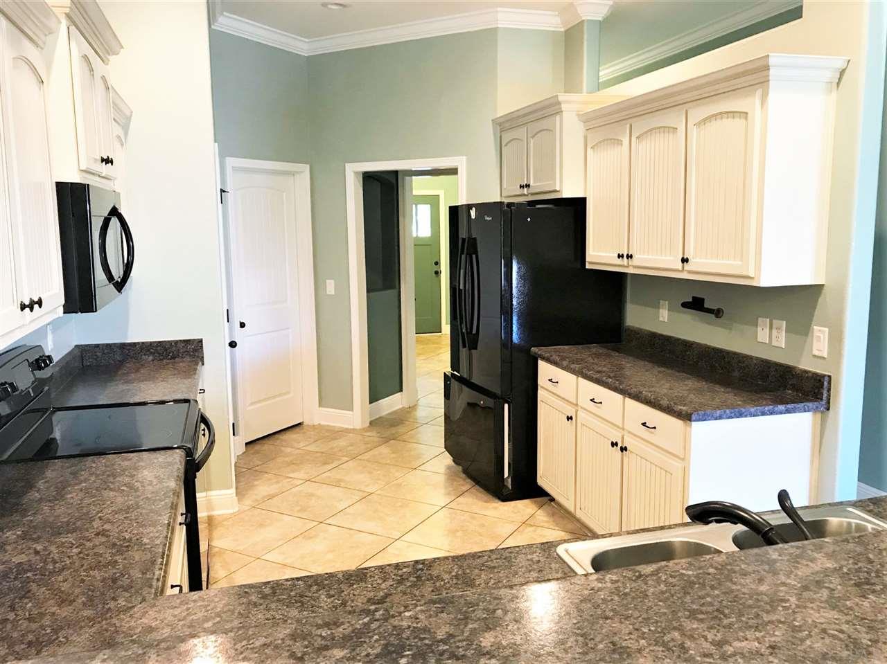 3839 Adams Road Pace, FL 32571 - Photo 6 of 27 Laundry room is located off the kitchen.