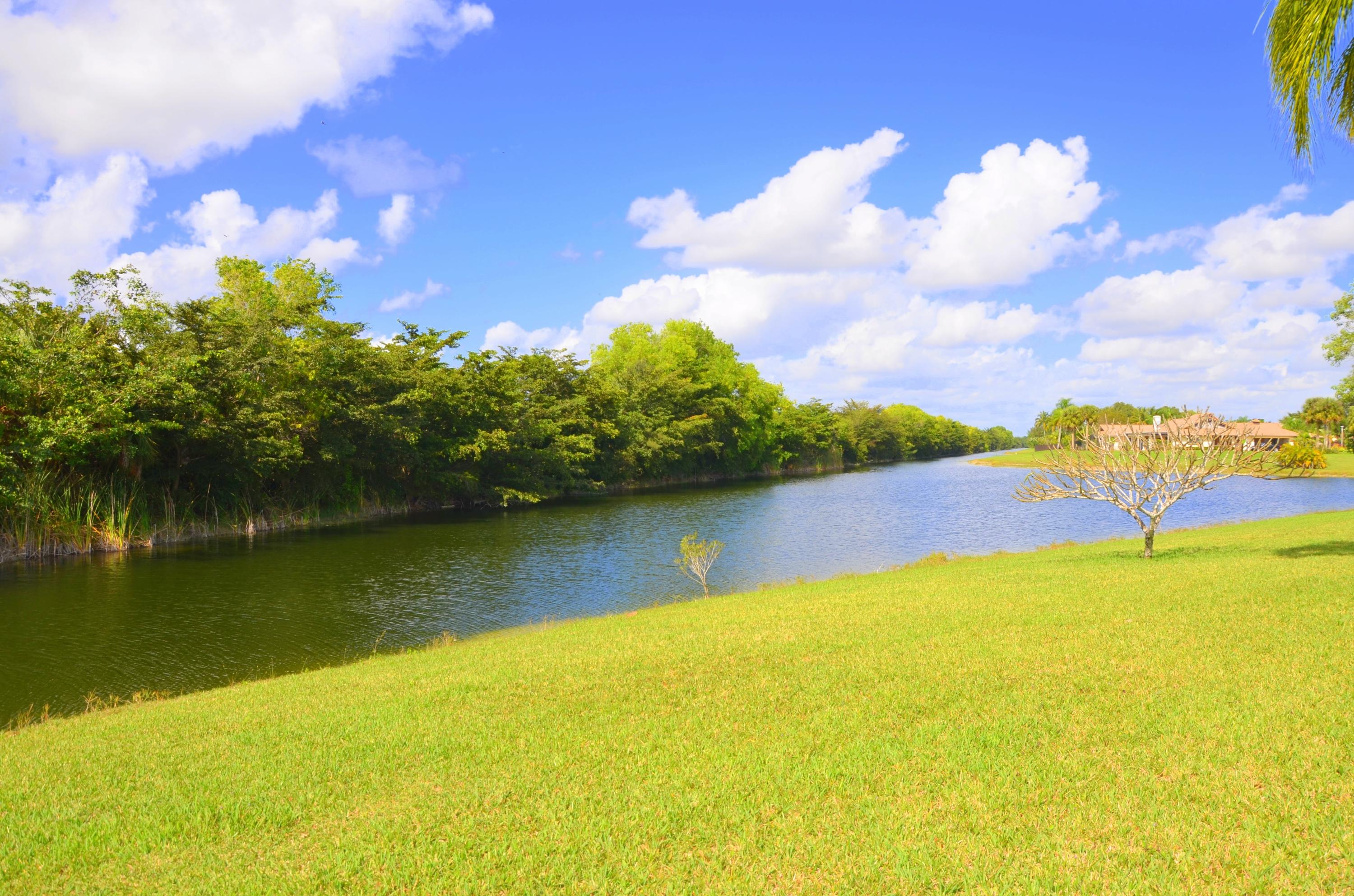 11897 Sandlake Drive Boca Raton, FL 33428 - Photo 19 of 27 Canal to lake view