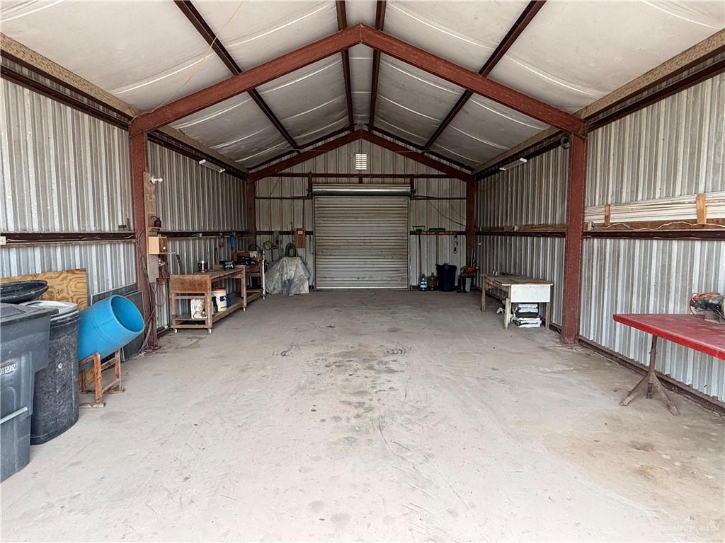 21713 North Western Road Edinburg, TX 78541 - Photo 21 of 24 Garage featuring metal wall