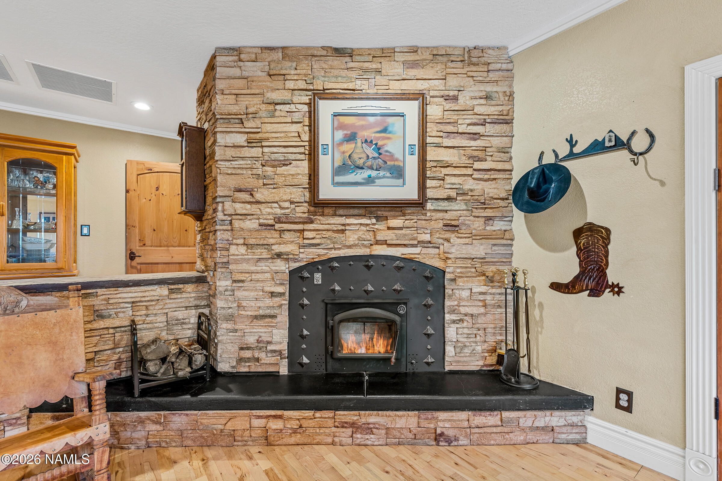8921 Hulls Road Flagstaff, AZ 86004 - Photo 14 of 80 Cozy Up around the fireplace