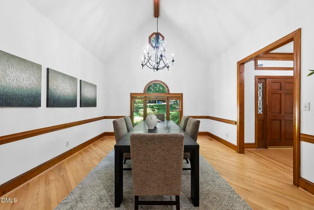 a view of a hallway with furniture