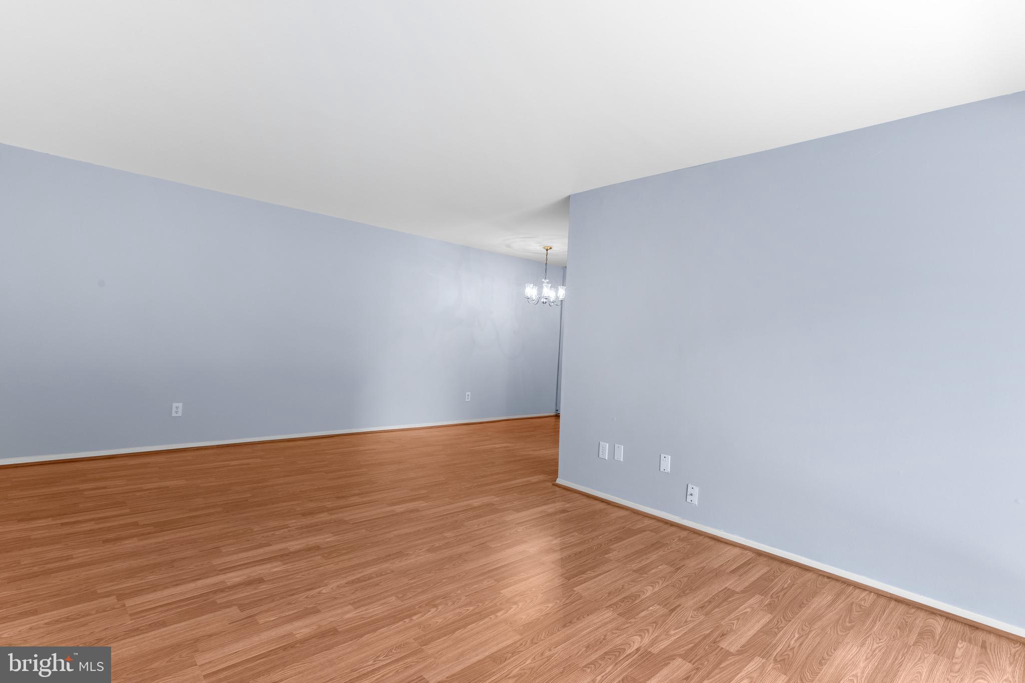 1 Summit Hill Court, Unit T2 Baltimore, MD 21228 - Photo 3 of 24 Living area open to dining room