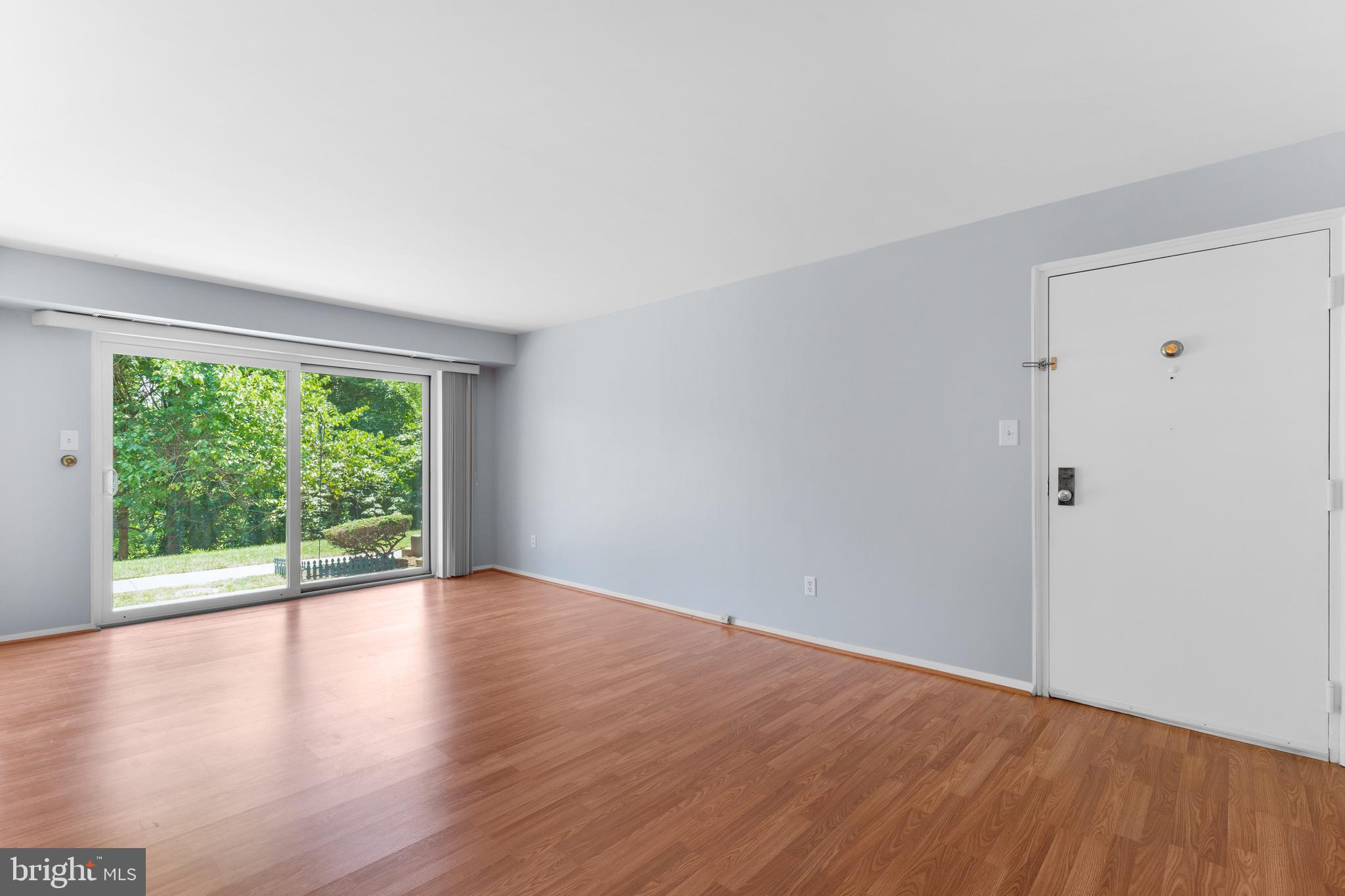 1 Summit Hill Court, Unit T2 Baltimore, MD 21228 - Photo 5 of 24 Newer doors and windows letting lots of light in