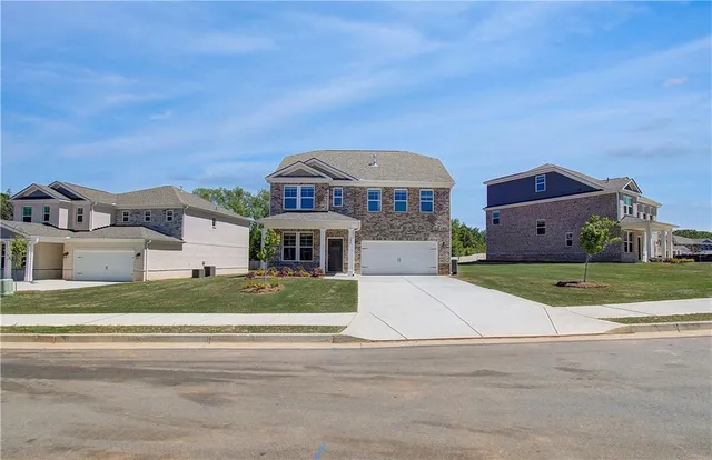 front view of a house with a street