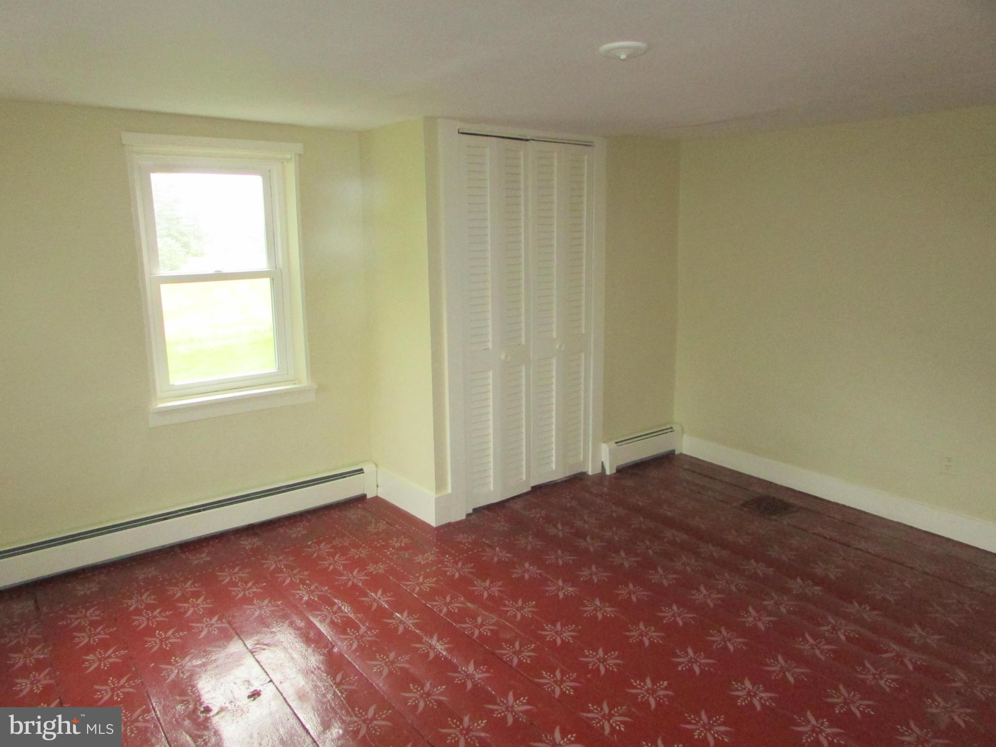 2506 Albert Rill Road Westminster, MD 21157 - Photo 13 of 29 Bedroom 2 with stenciled wood floor