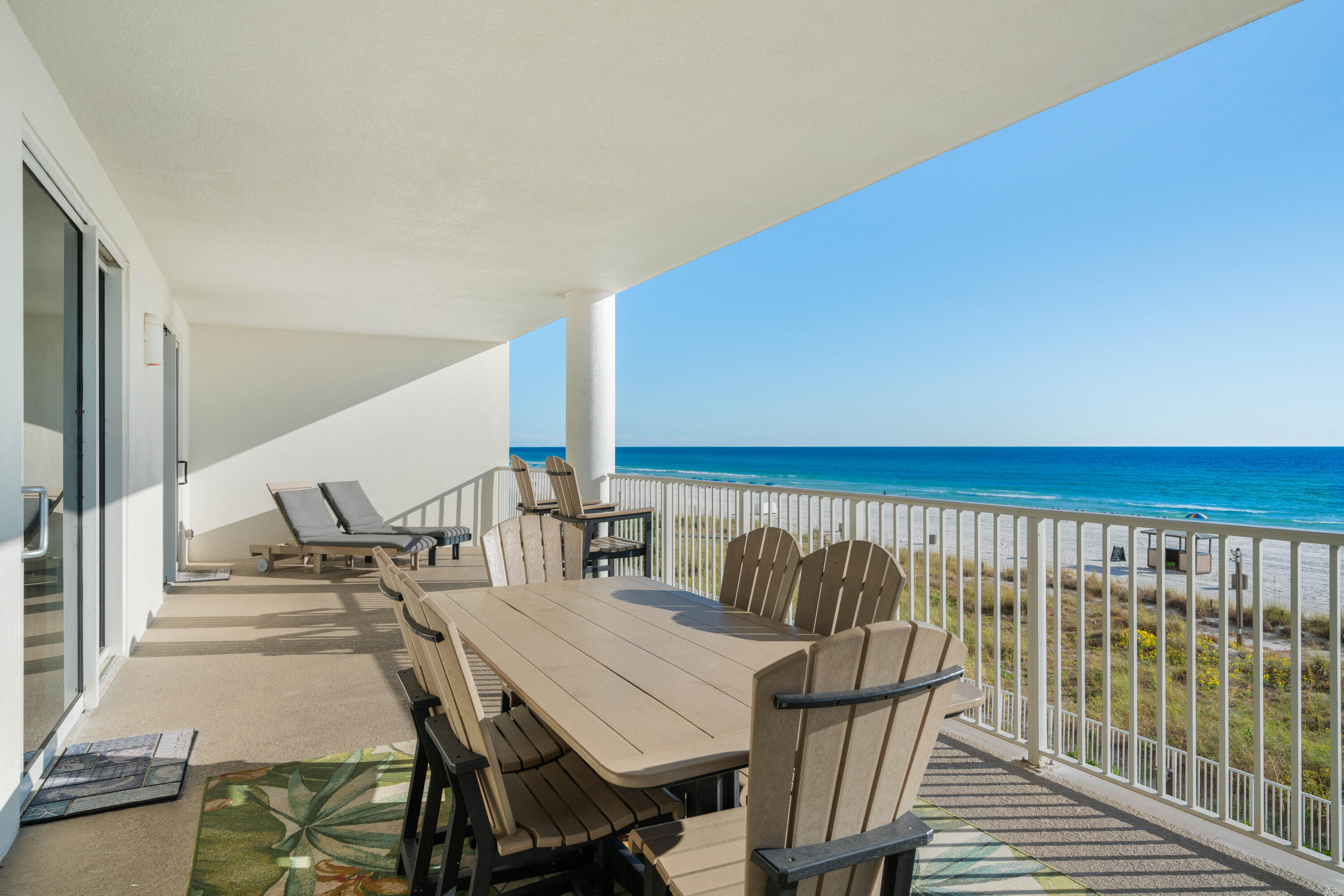 10611 Front Beach Road, Unit 303 Panama City Beach, FL 32408 - Photo 20 of 51 a view of balcony and patio with wooden floor