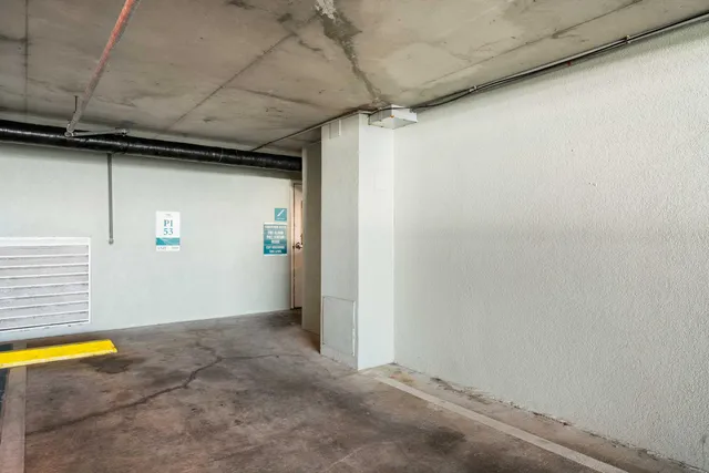 a city view with tall buildings and a street