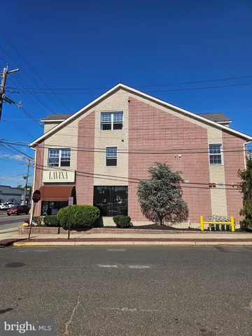 a view of a house with a street