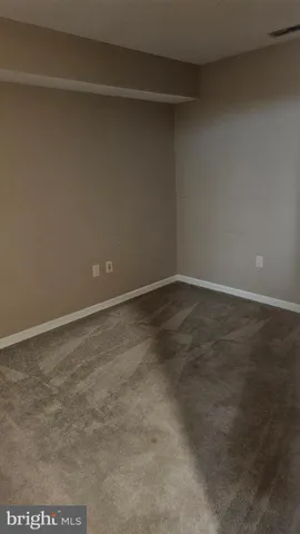 a bathroom with a shower and a toilet