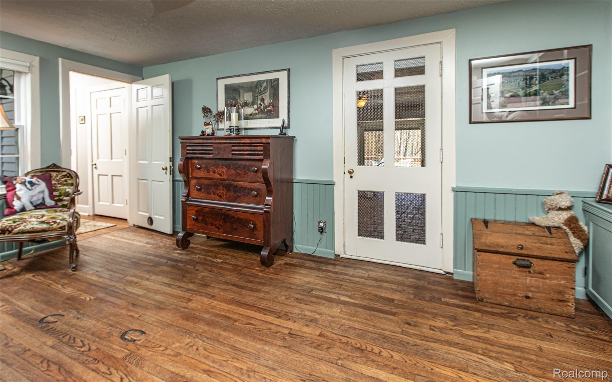 5820 Hempstead Road Metamora, MI 48455 - Photo 31 of 73 31 - Sitting Room leading to Family Room and Childrens Wing.jpg