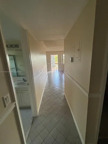 a view of a hallway with entryway