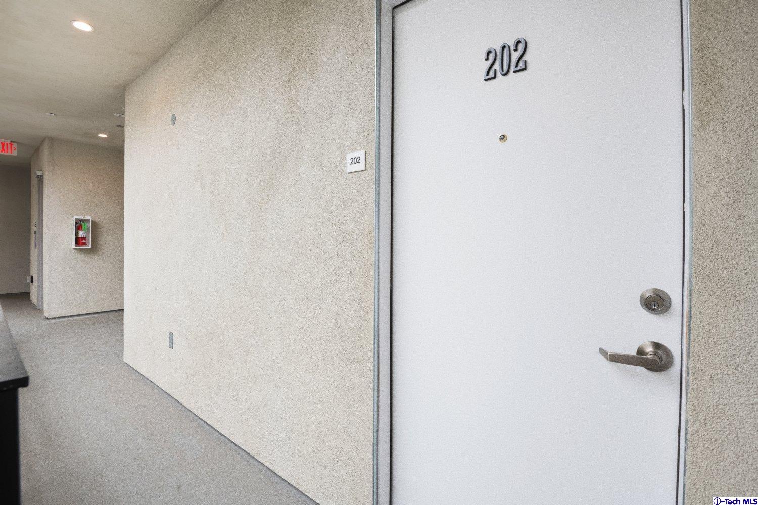 7064 Greeley Street, Unit 202 Tujunga, CA 91042 - Photo 15 of 45 a view of a hallway