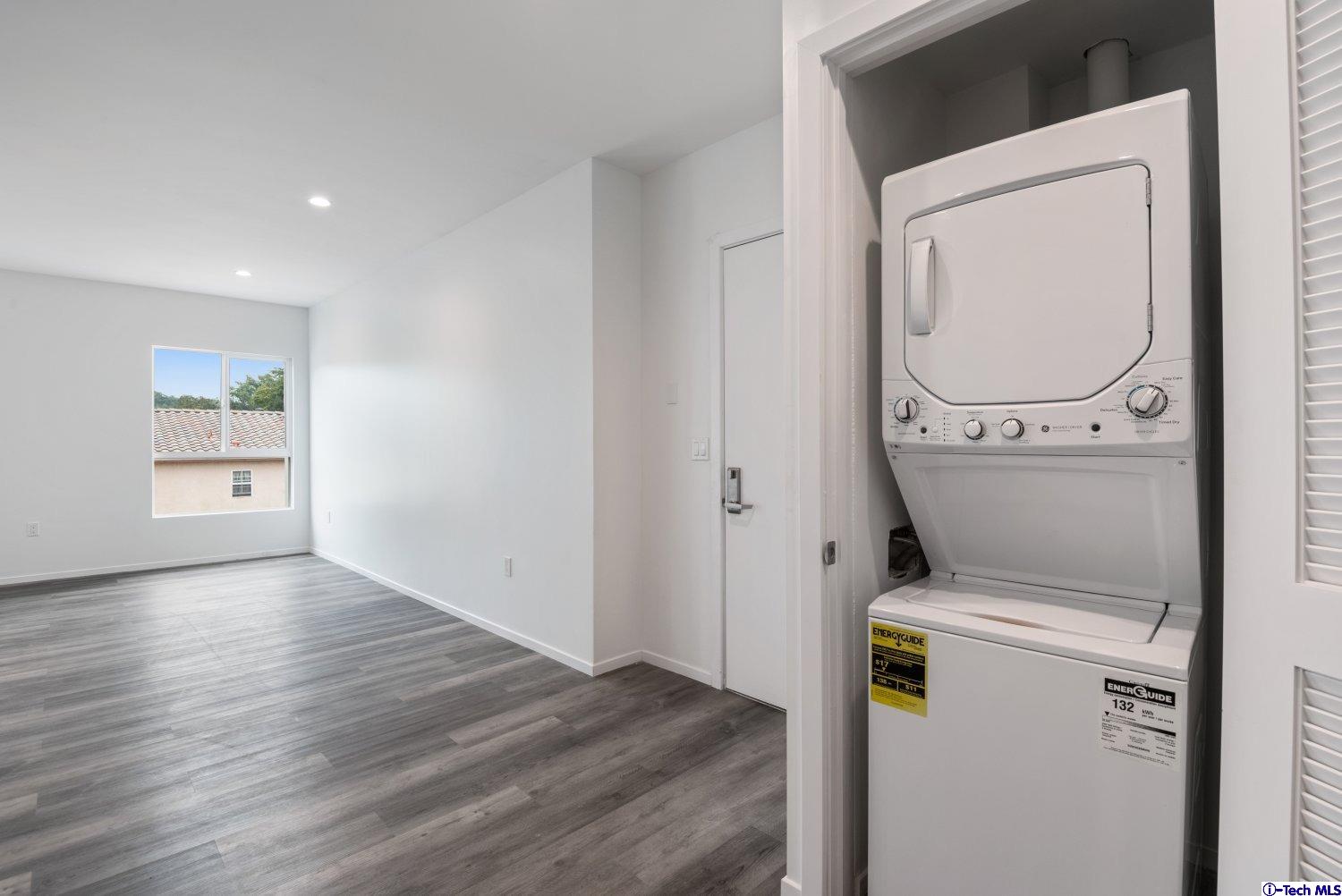 7064 Greeley Street, Unit 202 Tujunga, CA 91042 - Photo 25 of 45 a utility room with dryer and washer