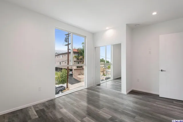 a view of livingroom with furniture and wooden floor