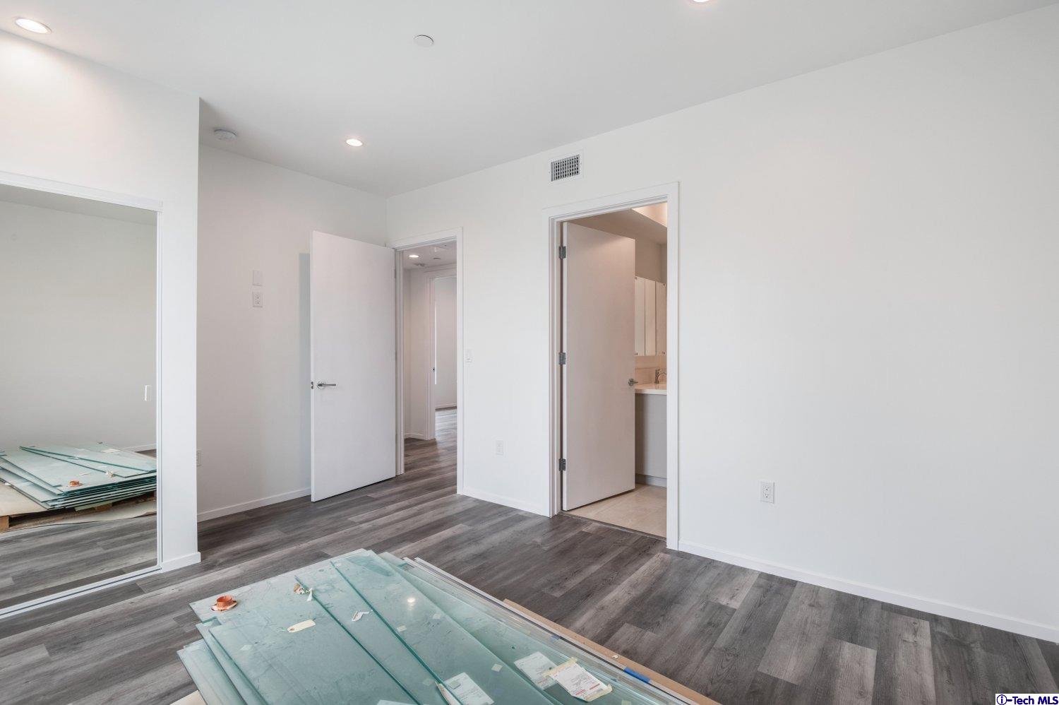 7064 Greeley Street, Unit 202 Tujunga, CA 91042 - Photo 33 of 45 a view of livingroom with furniture and wooden floor