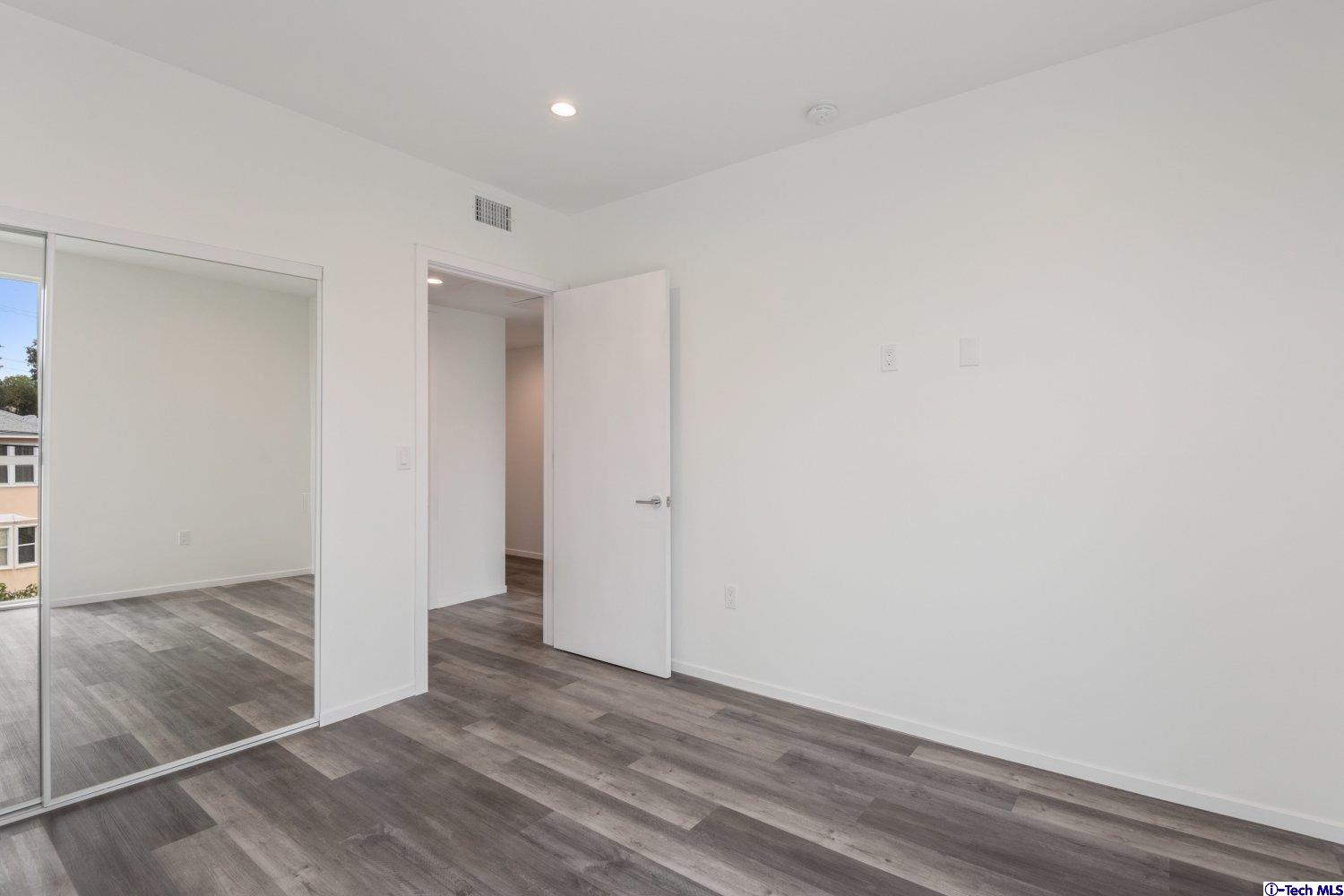 7064 Greeley Street, Unit 202 Tujunga, CA 91042 - Photo 37 of 45 a view of wooden floor
