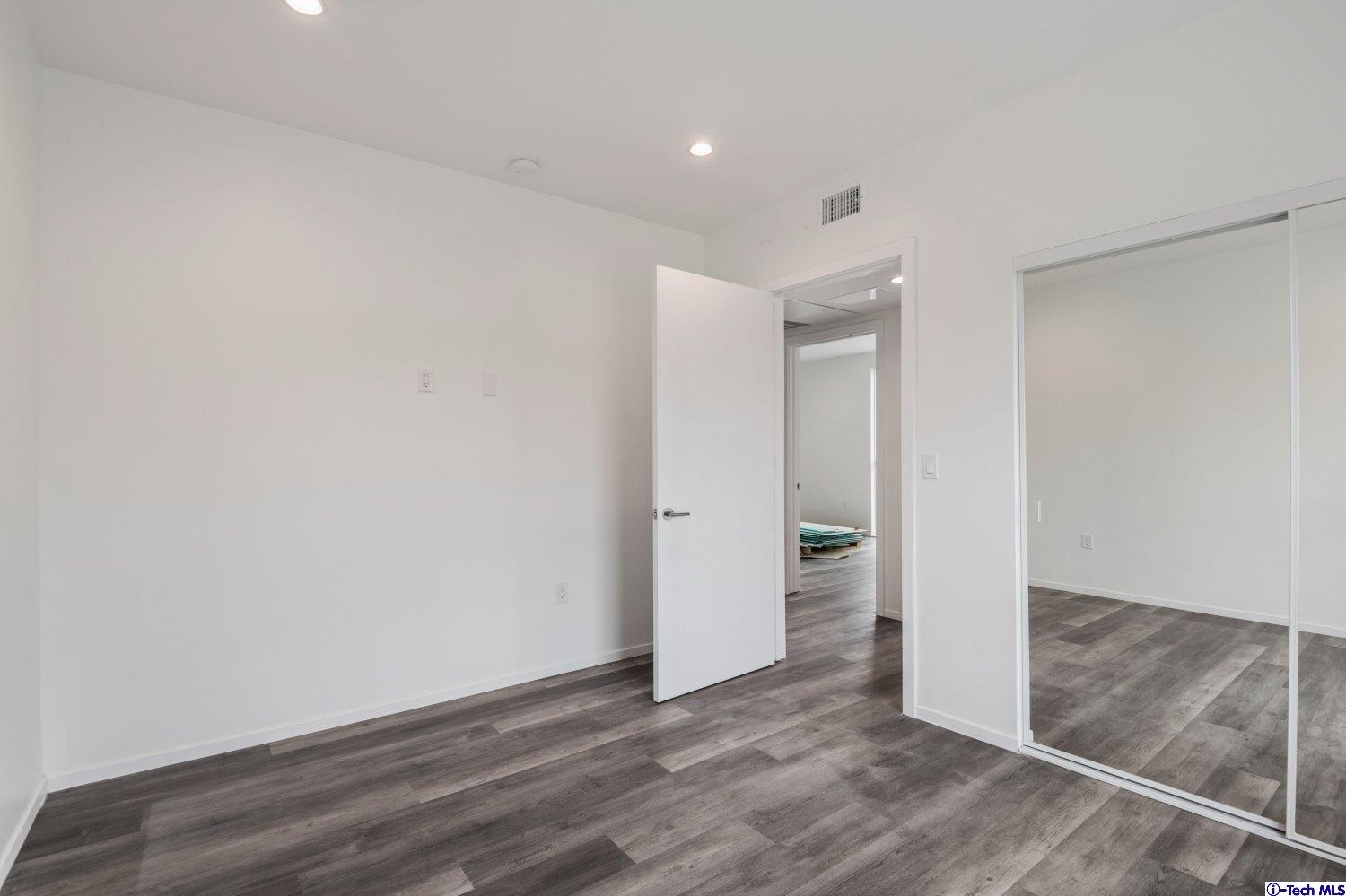 7064 Greeley Street, Unit 202 Tujunga, CA 91042 - Photo 40 of 45 a view of an empty room
