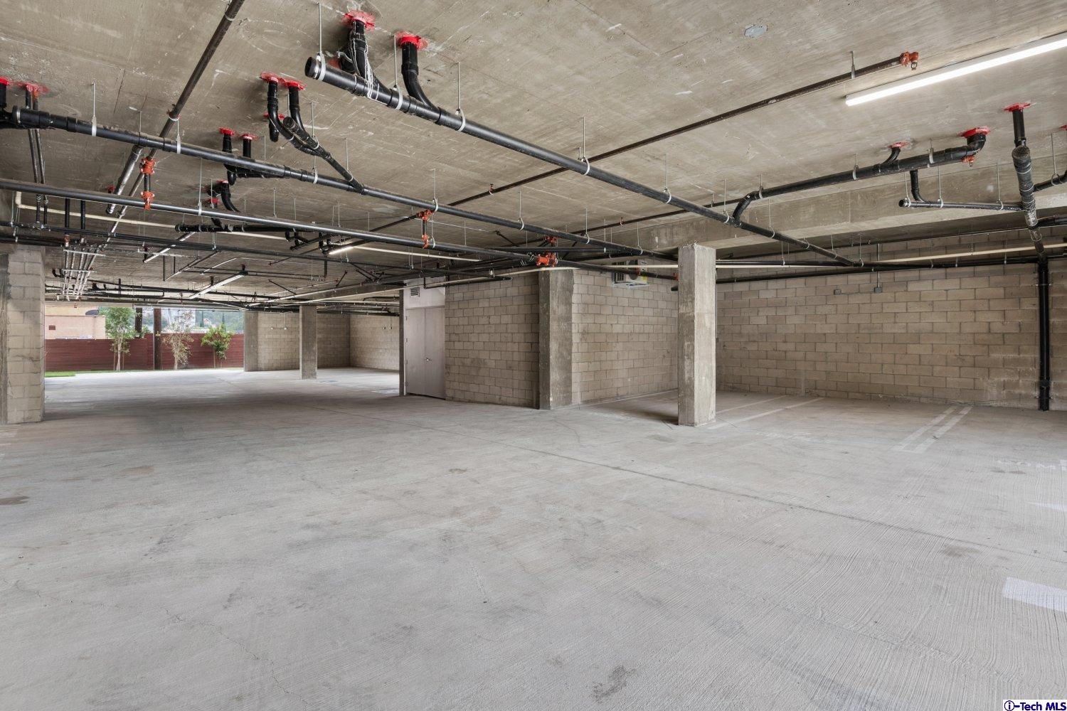7064 Greeley Street, Unit 202 Tujunga, CA 91042 - Photo 8 of 45 a view of a garage