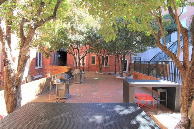 a view of a swimming pool with a patio
