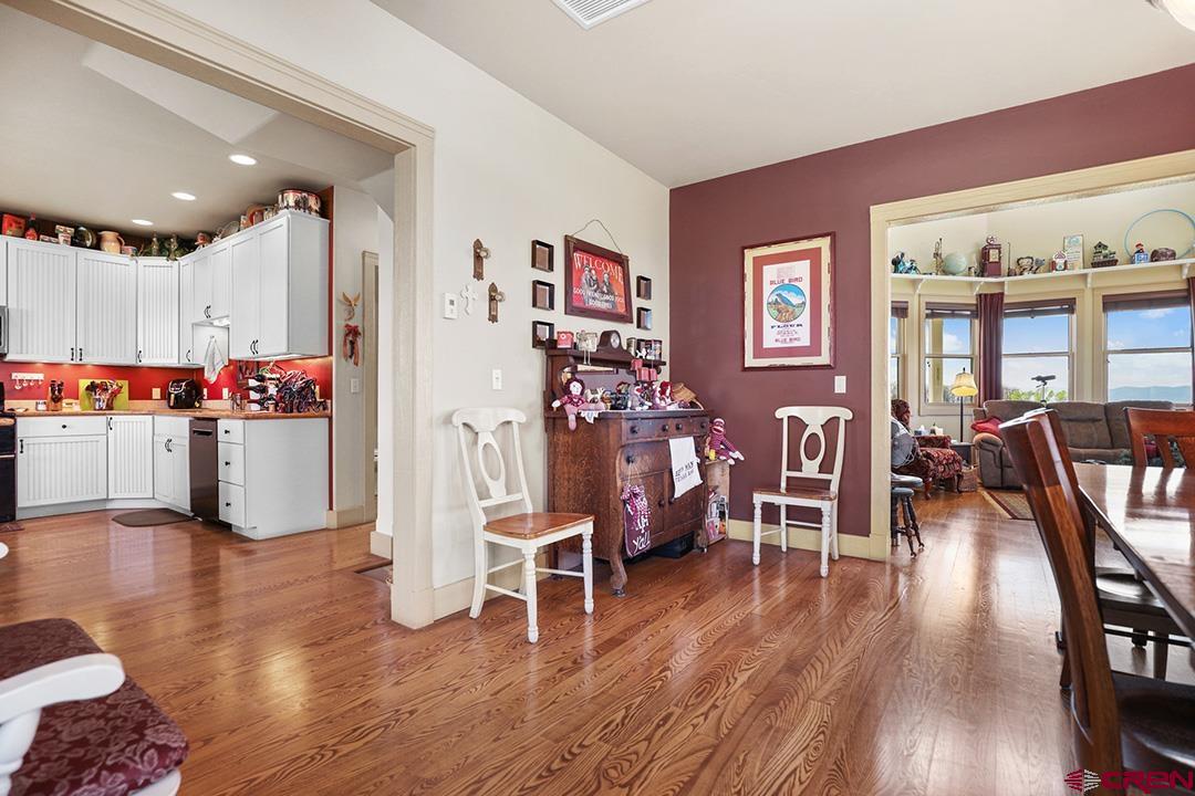 22259 Rd U Cortez, CO 81321 - Photo 12 of 35 a living room with furniture and wooden floor