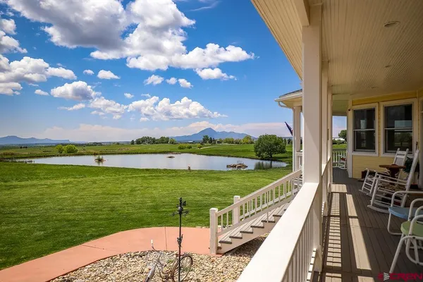 a view of a balcony with lake view