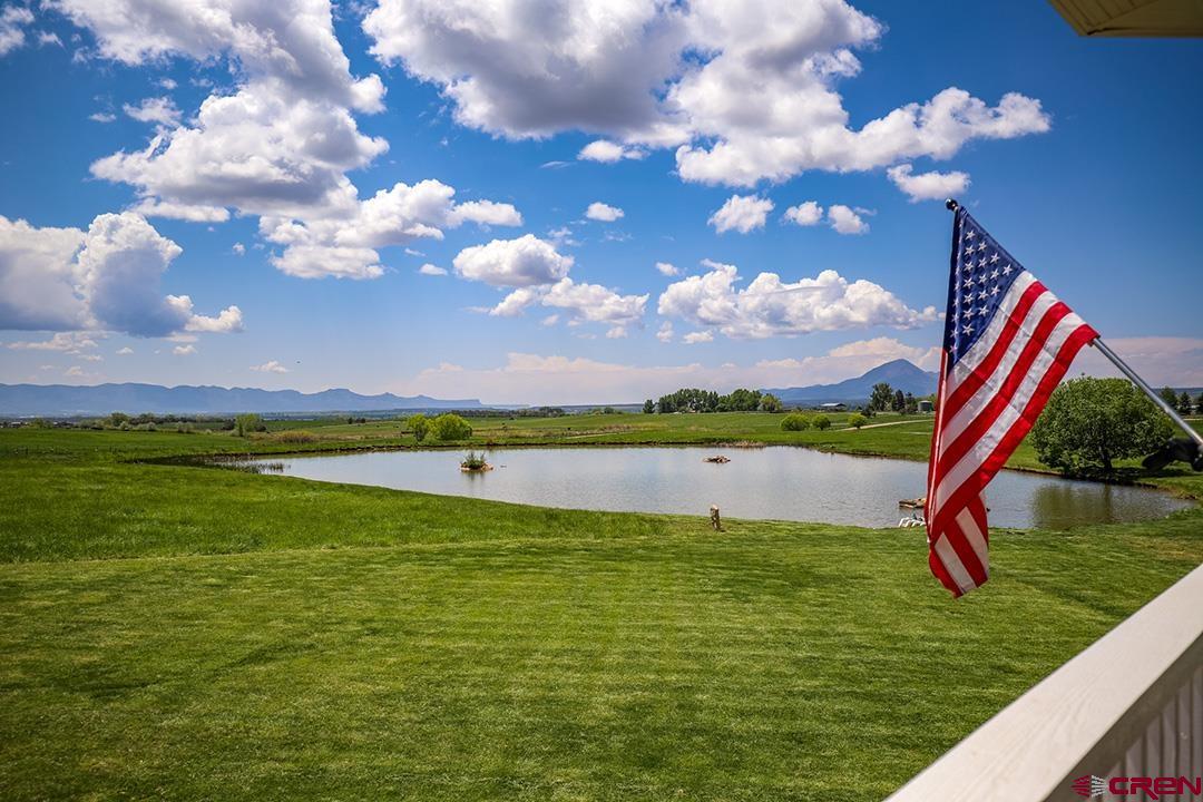 22259 Rd U Cortez, CO 81321 - Photo 8 of 35 a view of lake with green space