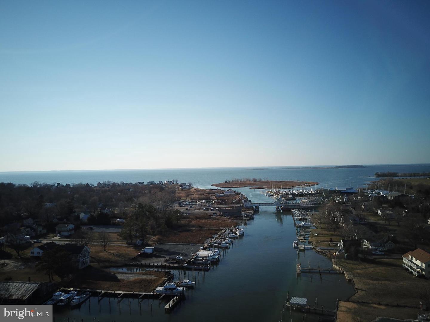 21552 Chicken Point Road Tilghman, MD 21671 - Photo 10 of 14 an aerial view of residential building and lake view