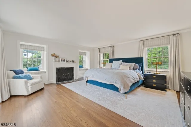 a bedroom with a balcony a bed and a couch