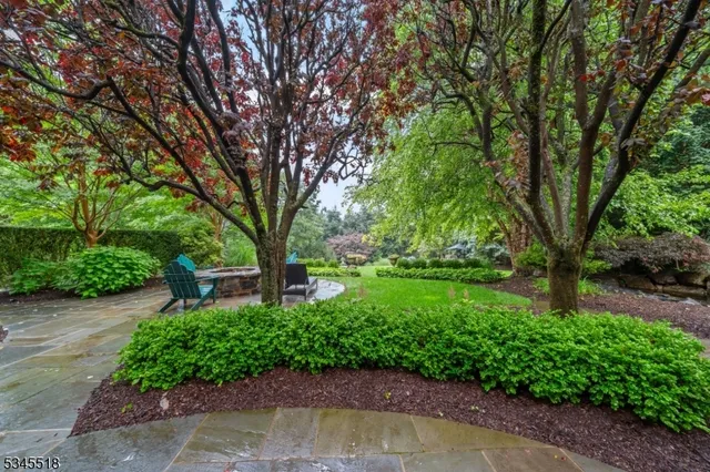 a wooden bench sitting in middle of a park