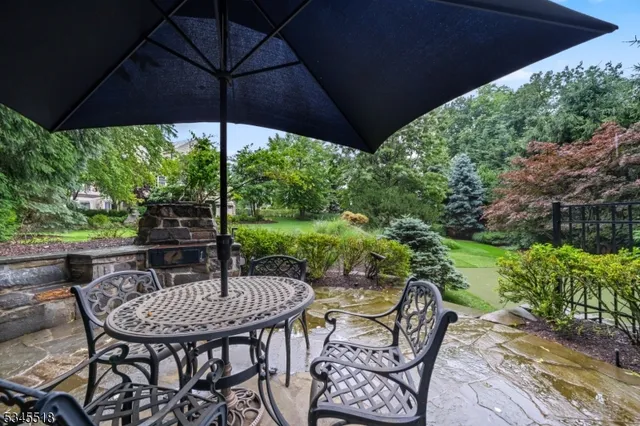 a view of an outdoor sitting area with furniture