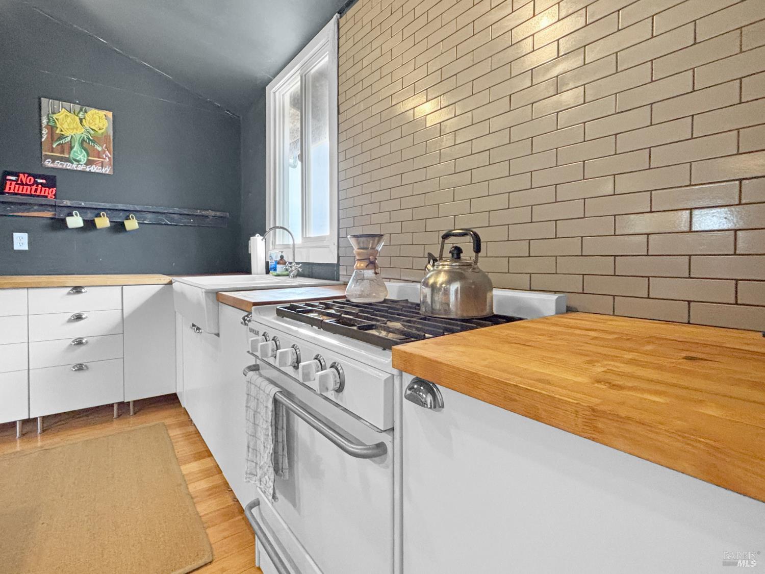 56801 Registered Guest Road Laytonville, CA 95454 - Photo 15 of 22 a kitchen with a stove and a window