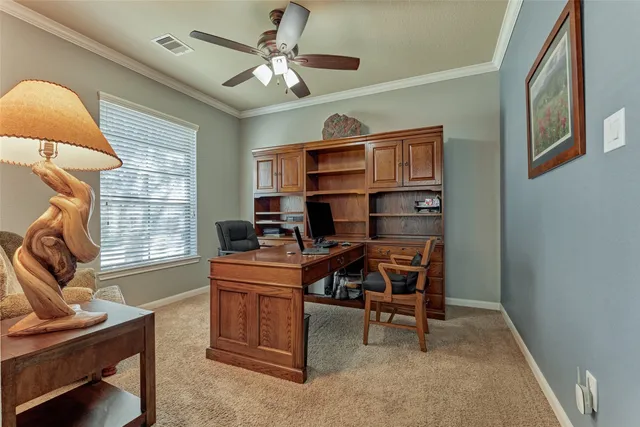 a view of a workspace with furniture