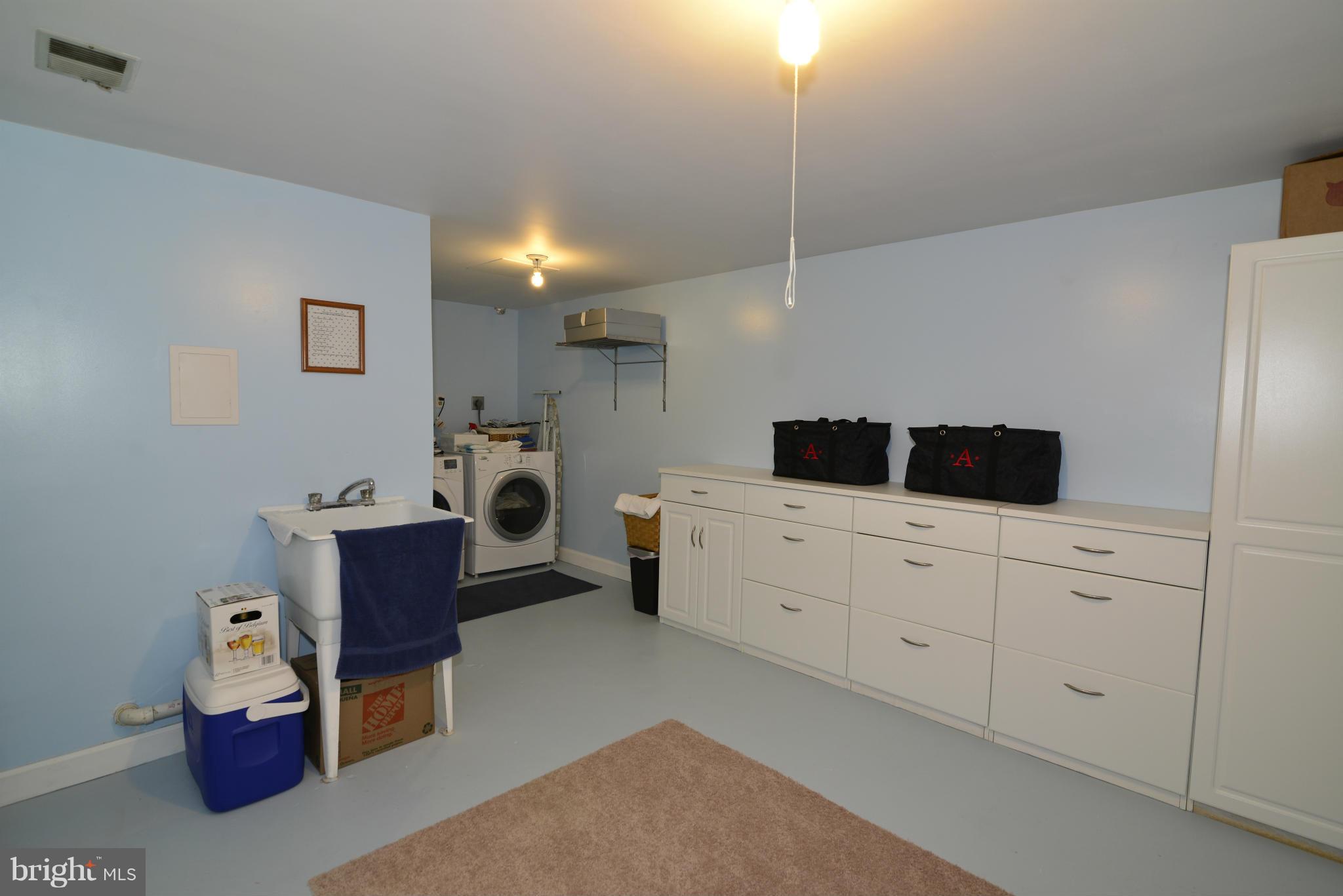 12019 Insha Court Reston, VA 20191 - Photo 22 of 27 a room with a chair and dresser