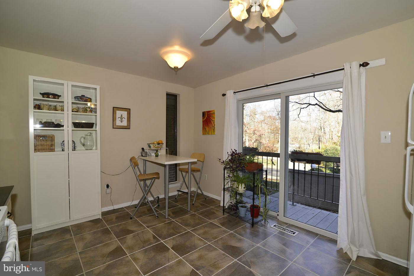 12019 Insha Court Reston, VA 20191 - Photo 7 of 27 a view of a livingroom with furniture window and outside view