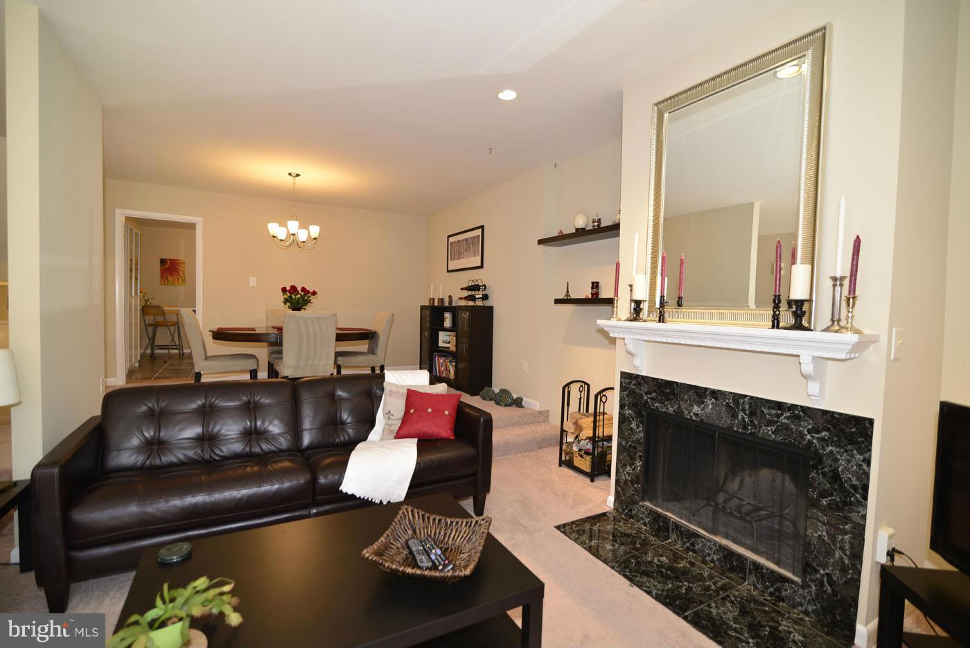 12019 Insha Court Reston, VA 20191 - Photo 9 of 27 a living room with furniture and a fireplace
