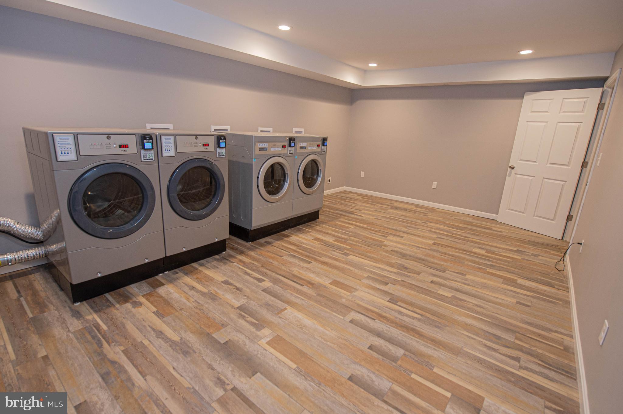 308 North Division Street, Unit 7 Salisbury, MD 21801 - Photo 11 of 56 a utility room with dryer and washer