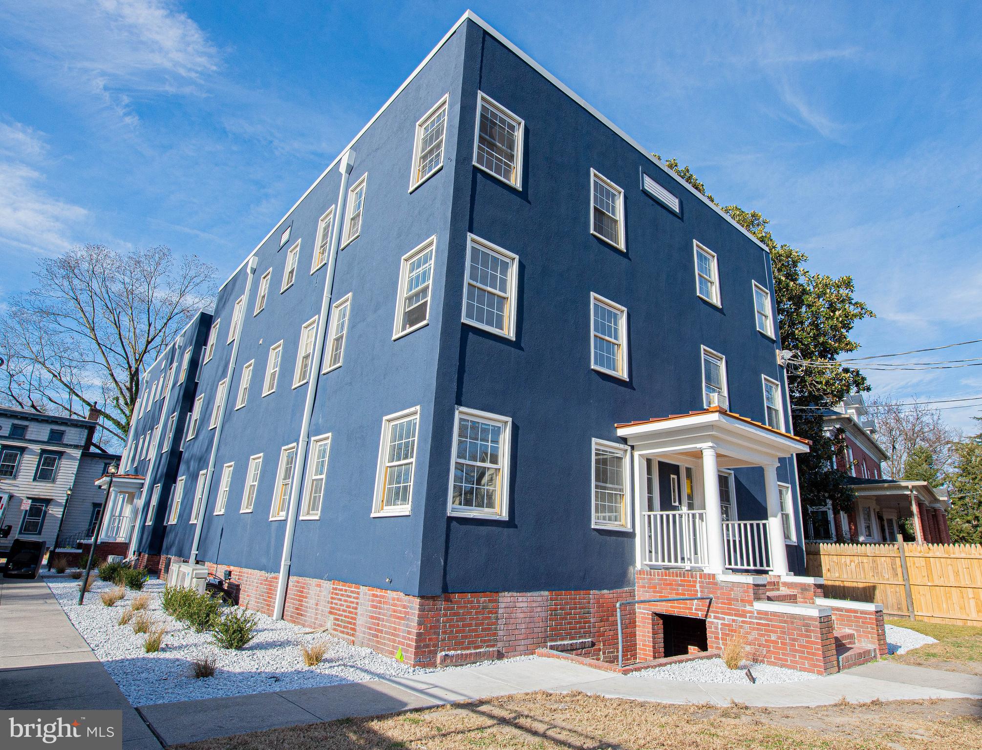308 North Division Street, Unit 7 Salisbury, MD 21801 - Photo 4 of 56 a front view of a building with street