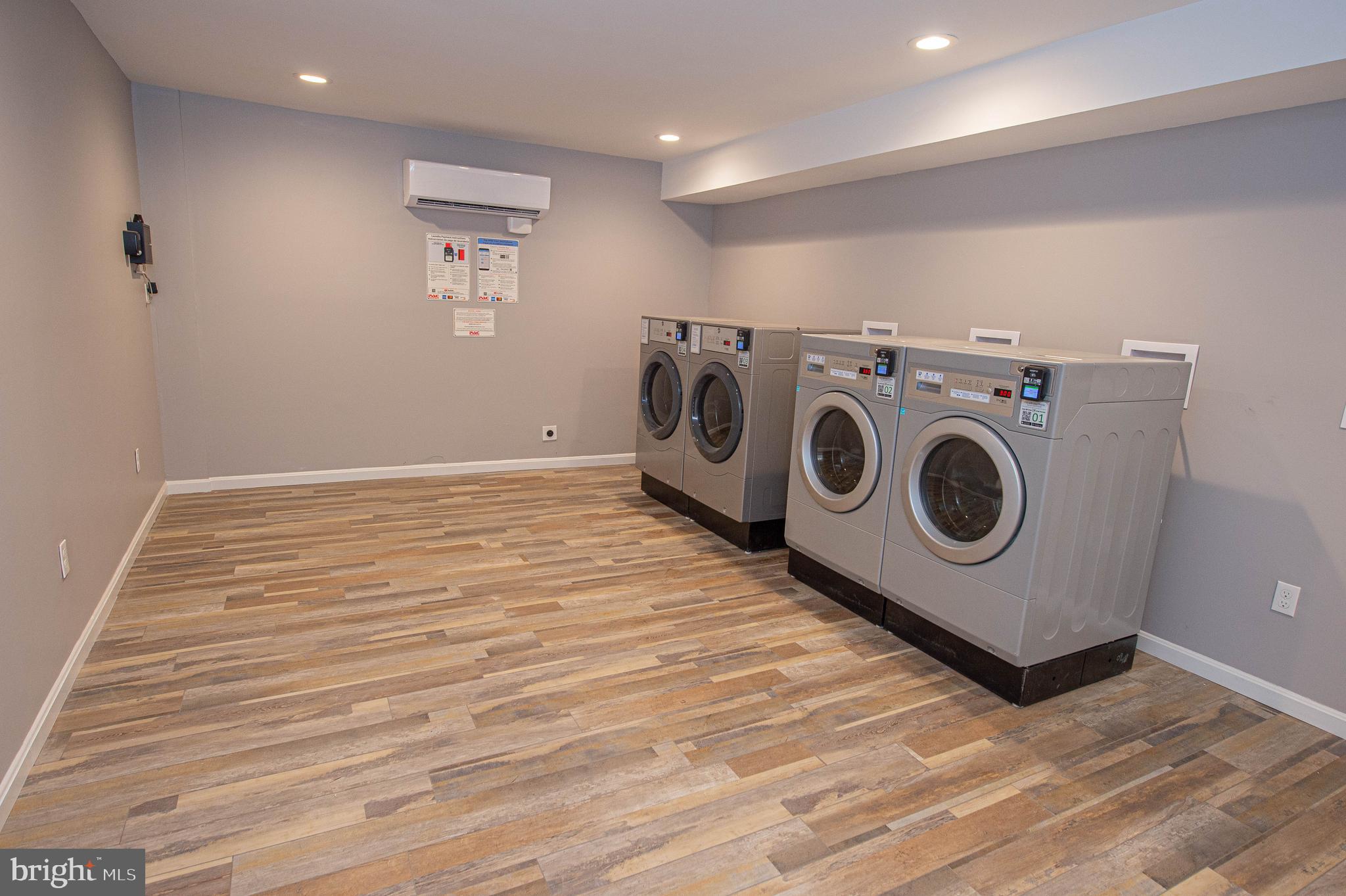 308 North Division Street, Unit 7 Salisbury, MD 21801 - Photo 9 of 56 a utility room with dryer and washer