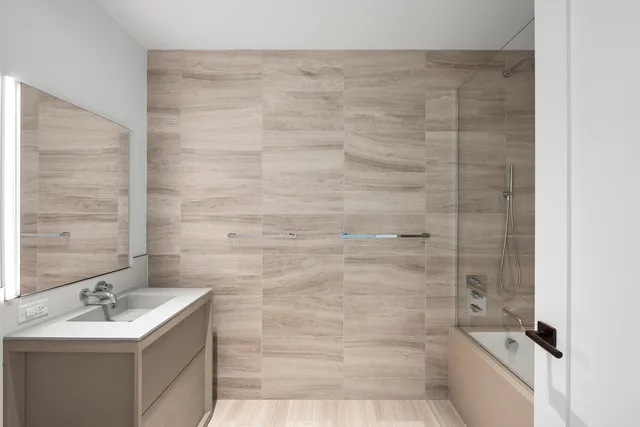 a bed room with a bed and a window