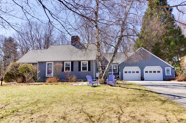7 Longview Road Chelmsford, MA 01824 - Photo 1 of 18 a front view of house with yard and trees around