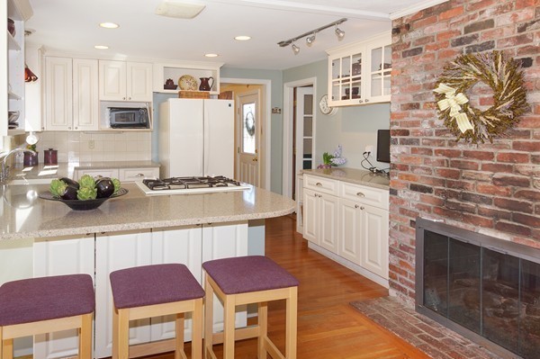 7 Longview Road Chelmsford, MA 01824 - Photo 4 of 18 a kitchen with stainless steel appliances granite countertop a stove a sink and a refrigerator