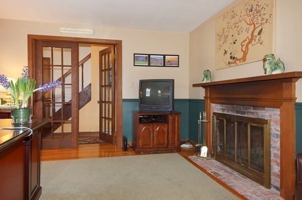 7 Longview Road Chelmsford, MA 01824 - Photo 6 of 18 a living room with furniture and a fireplace