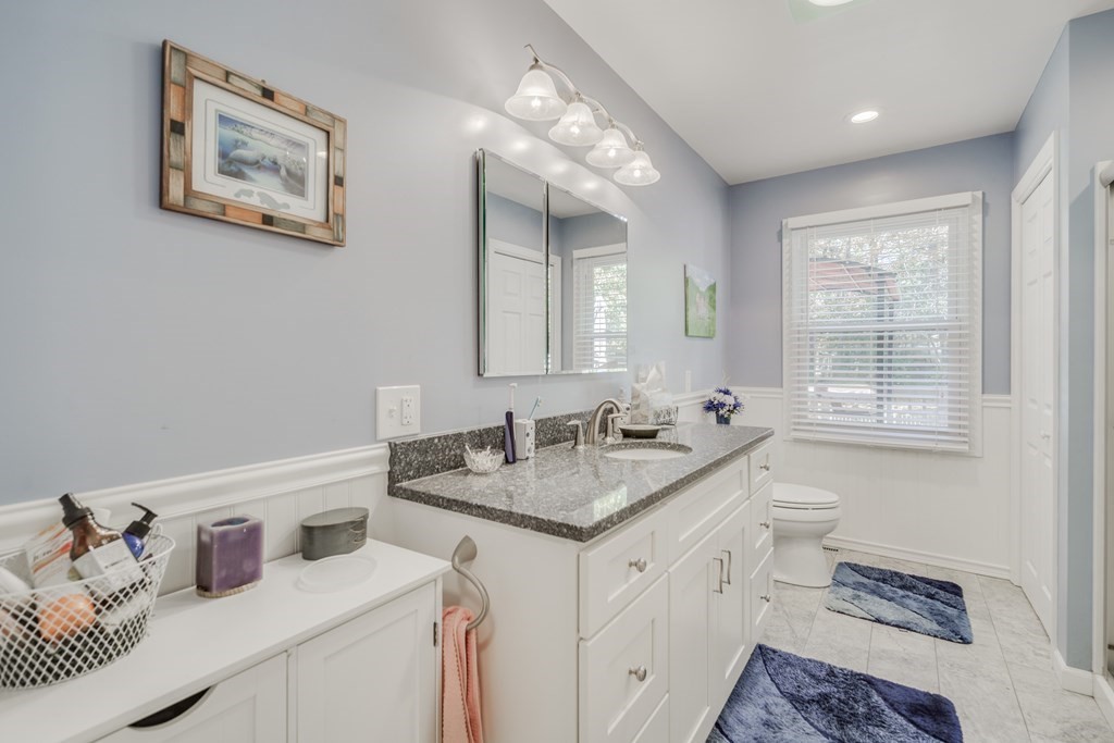 610 County Road, Unit 5 Holyoke, MA 01040 - Photo 19 of 33 a bathroom with a sink and a mirror