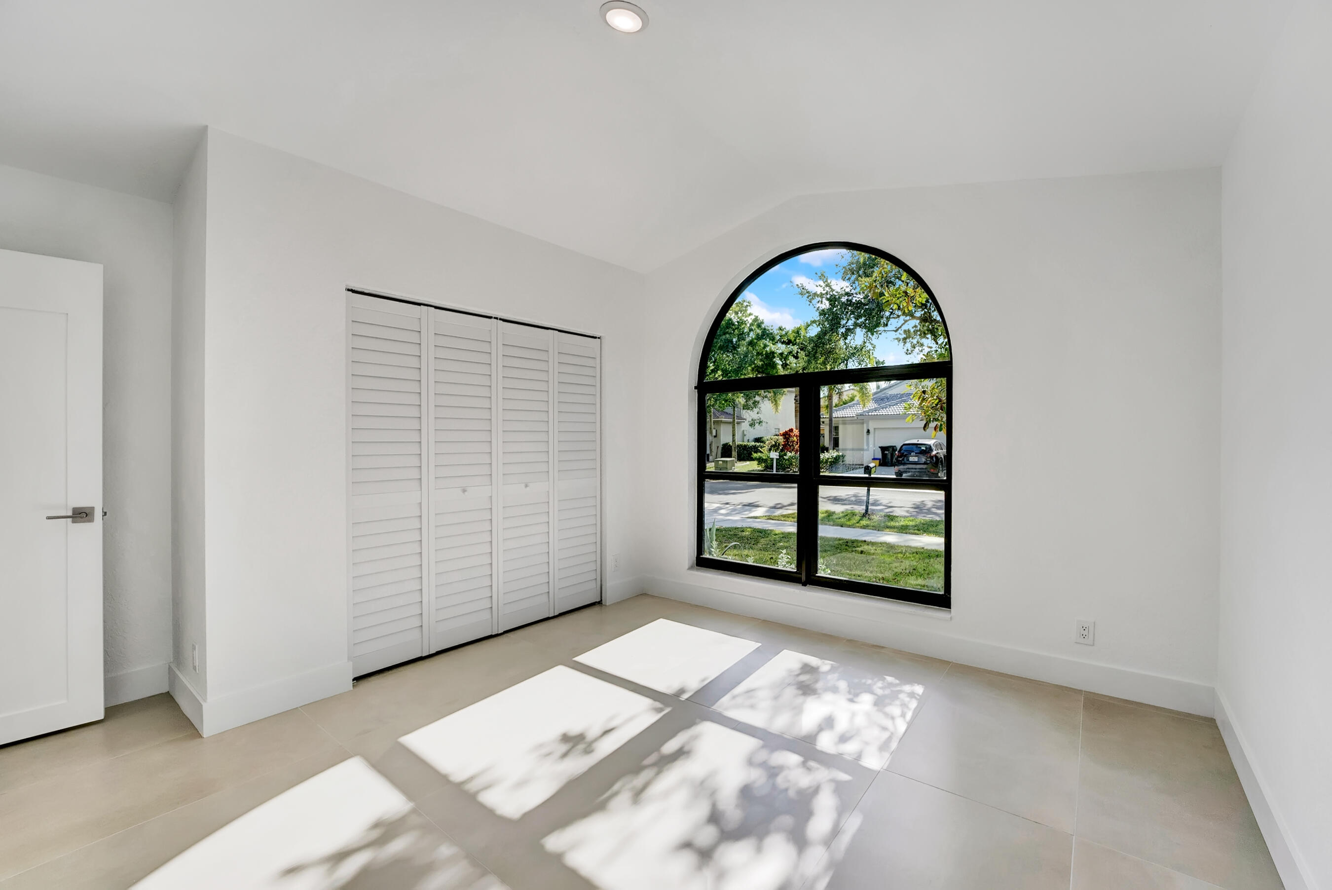 1175 Sea Grape Circle Delray Beach, FL 33445 - Photo 31 of 42 an empty room with windows