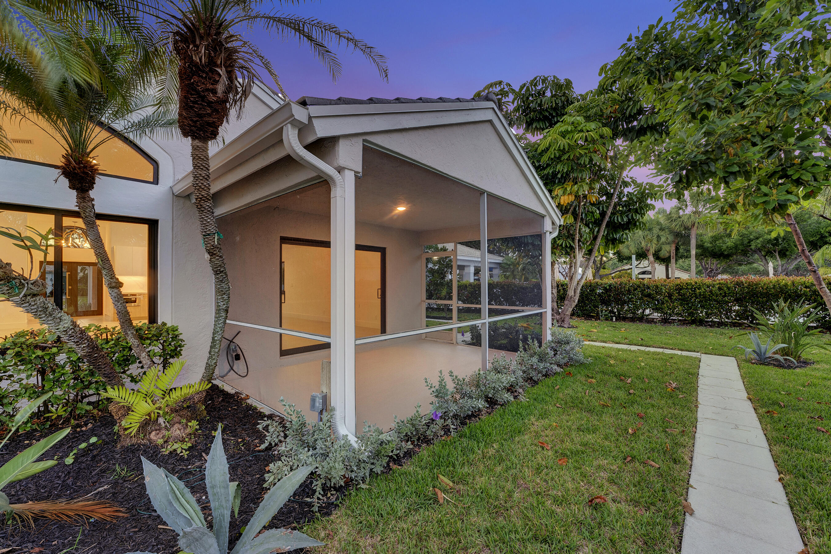 1175 Sea Grape Circle Delray Beach, FL 33445 - Photo 33 of 42 a view of a house with a yard