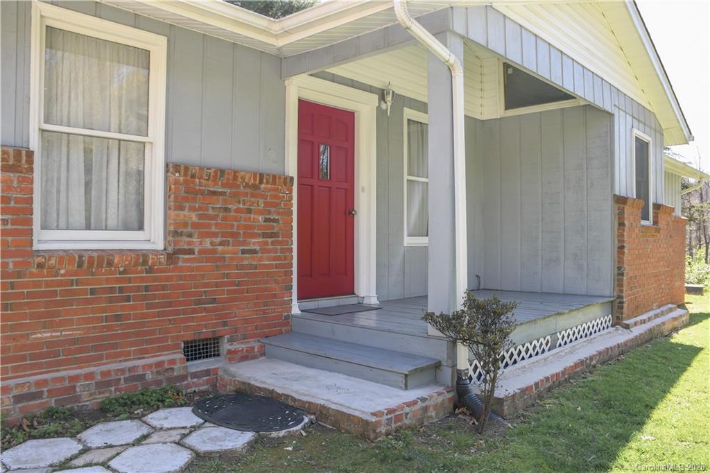 621 Incinerator Road Clyde, NC 28721 - Photo 2 of 27 a front view of a house with garden